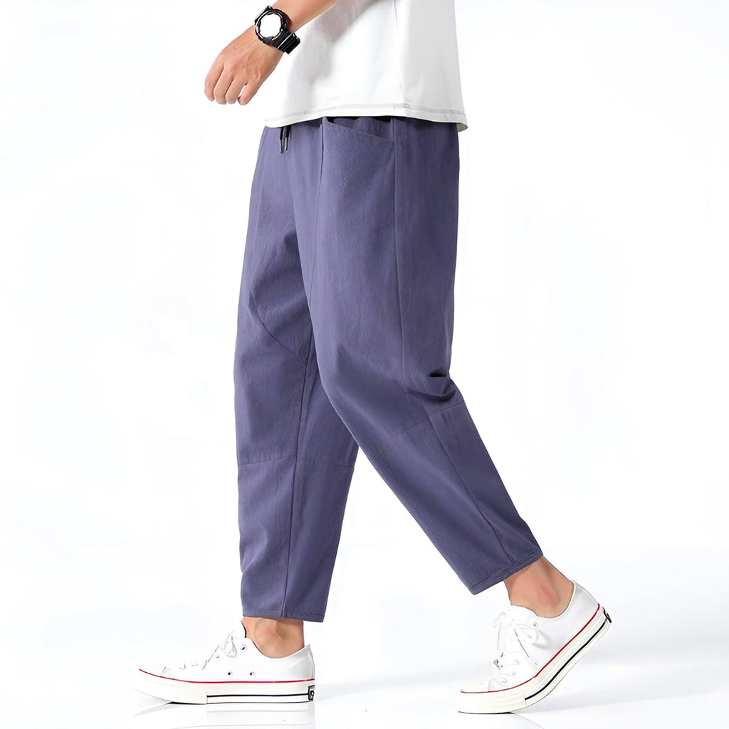 Men's indigo cropped relaxed trousers – side view