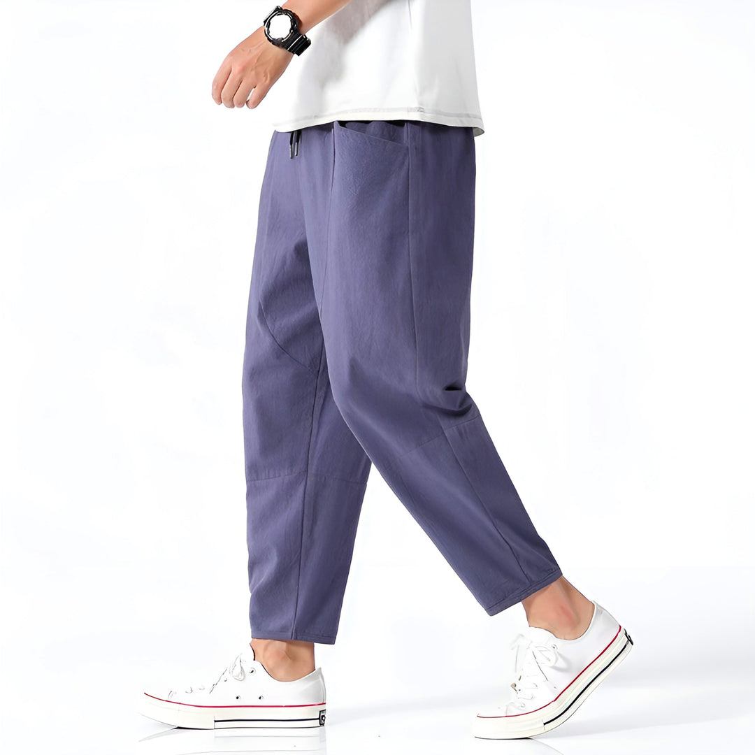 Men's indigo cropped relaxed trousers – side view