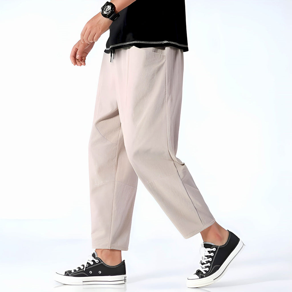 Men's rose beige relaxed trousers in motion