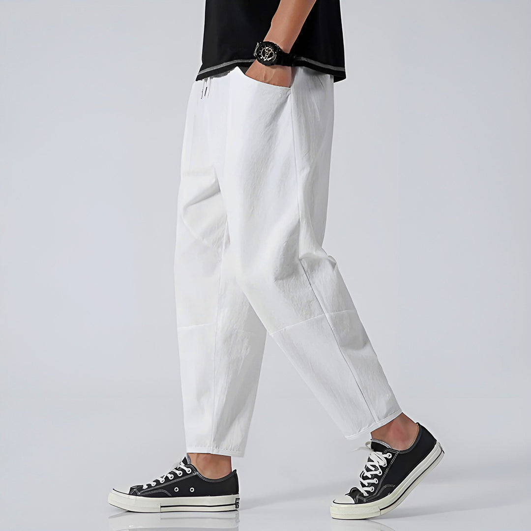 Men's white cropped relaxed trousers – side view