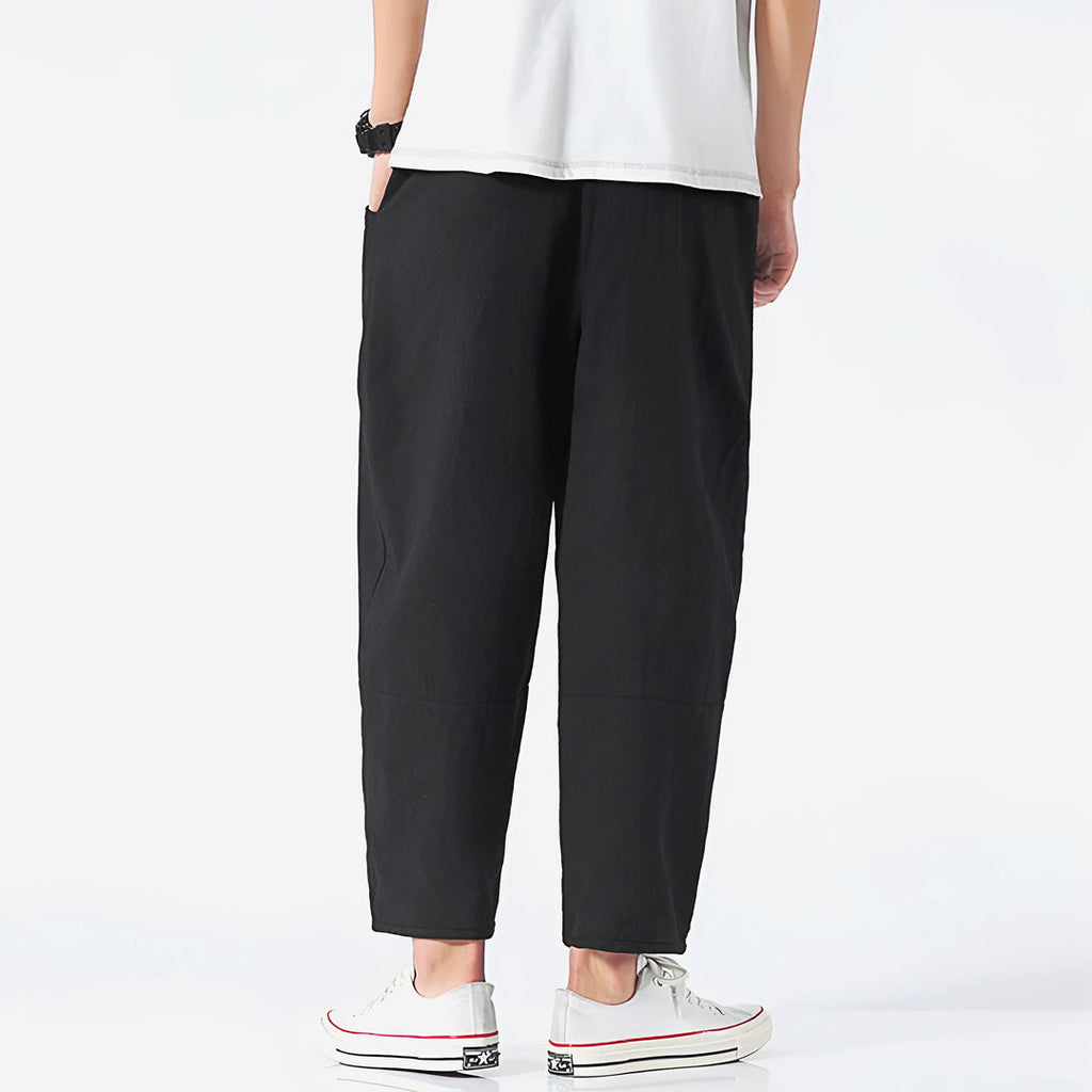 Men's black drawstring trousers – front view