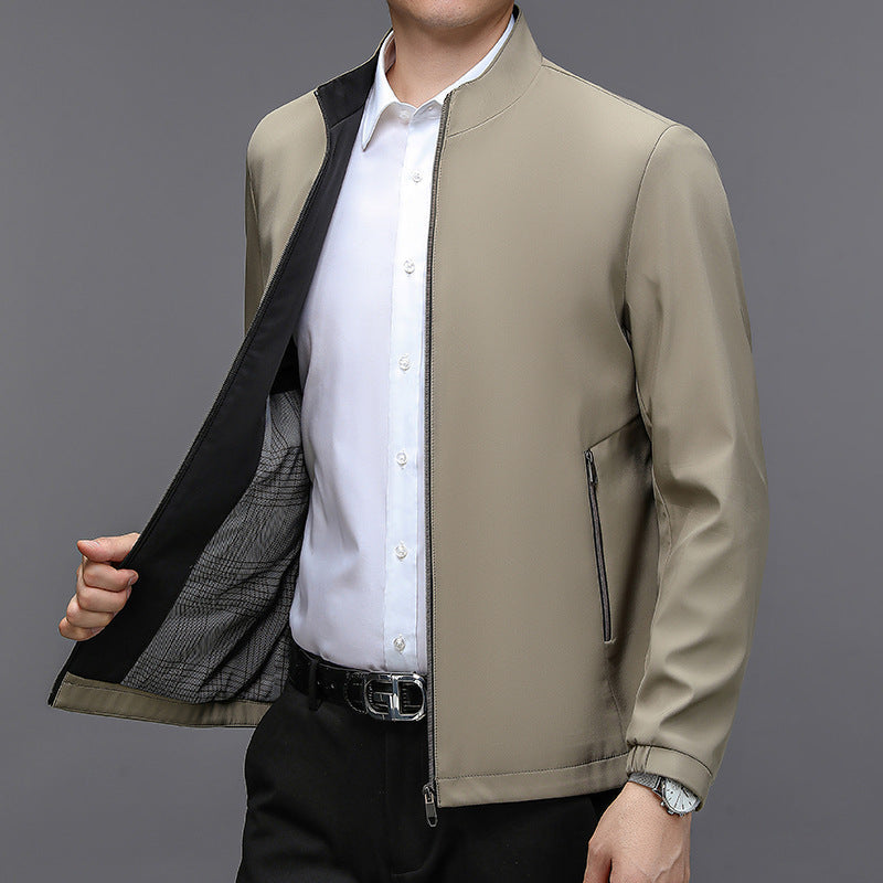 Man wearing the beige zip jacket open