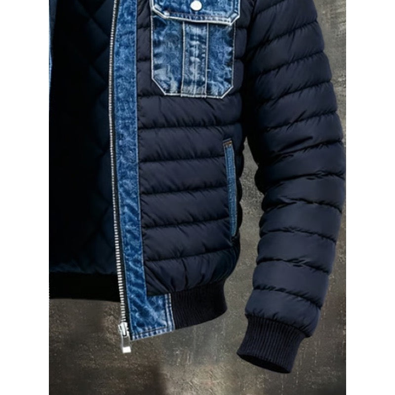 Men's quilted hybrid jacket with denim-look panels in blue, close-up of sleeve and ribbed cuff