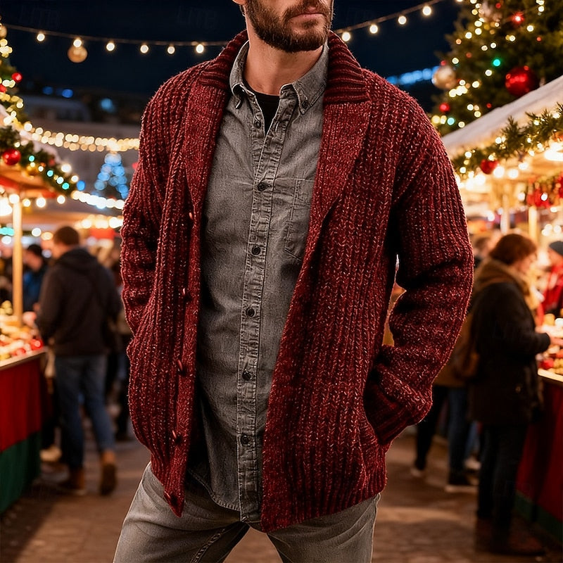 Man wearing the red shawl collar cardigan at a winter market