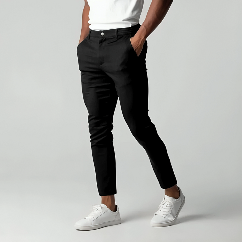 Men's black tapered chinos with white trainers