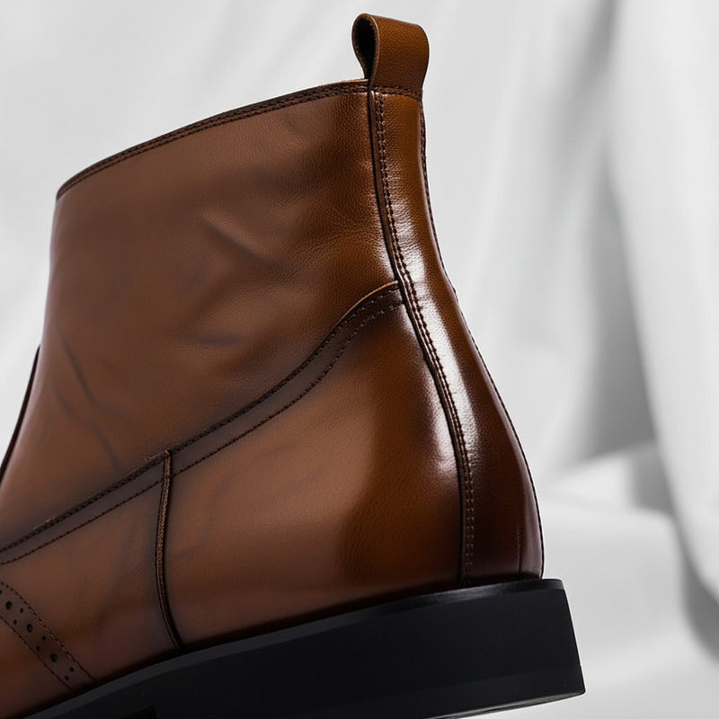 Brown brogue ankle boot – heel and pull tab view