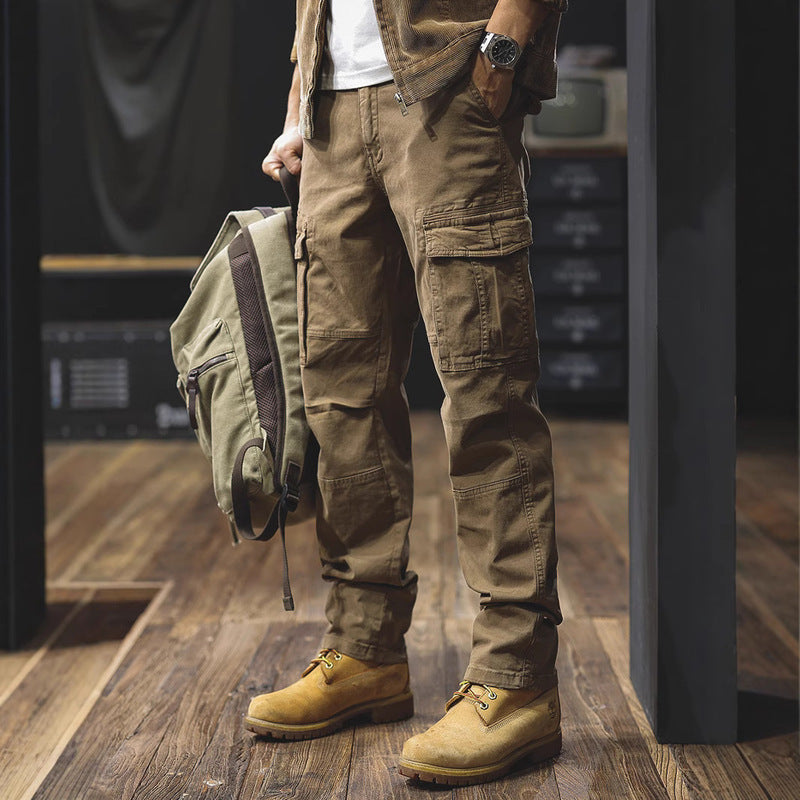 Man wearing brown cargo trousers with flap pockets and boots