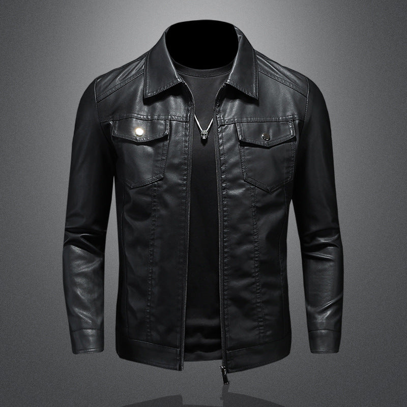 Black leather-look jacket with chest pockets on grey background