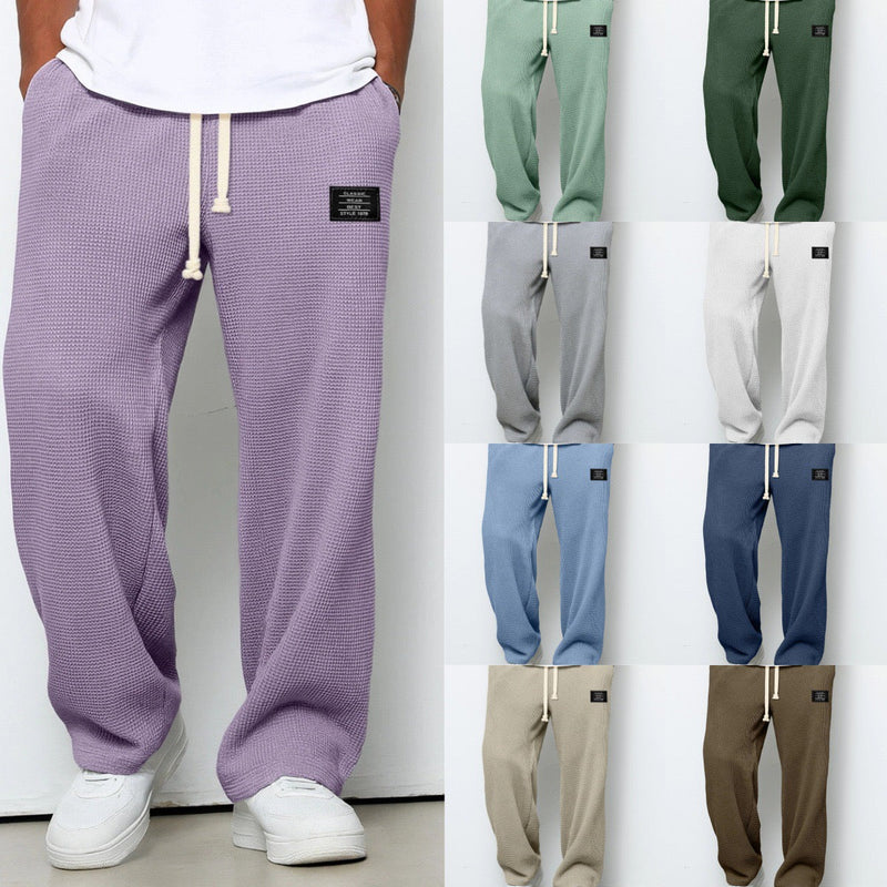 Men's relaxed fit drawstring trousers in purple with colour overview