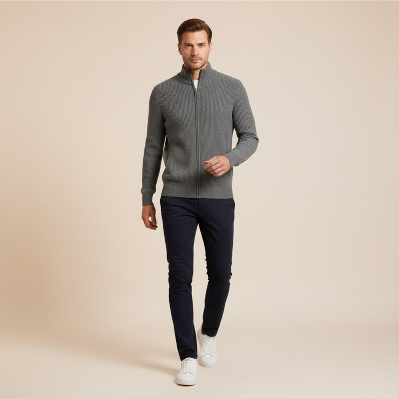 Men's grey ribbed zip cardigan with dark trousers