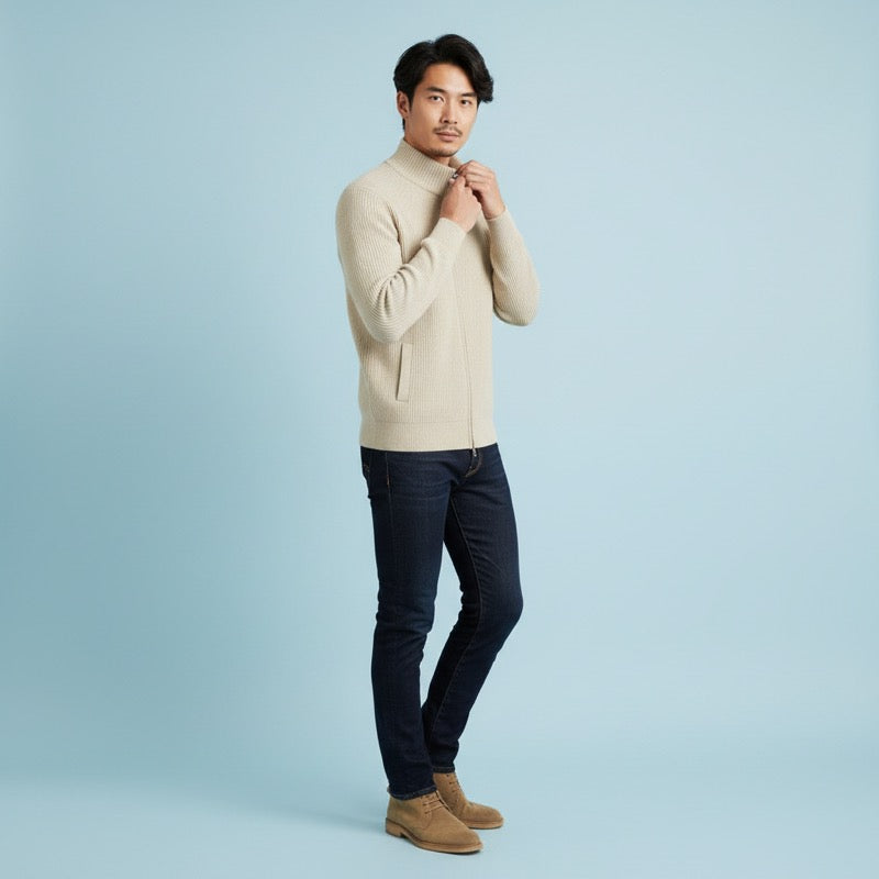 Man in a beige stand collar zip cardigan with jeans