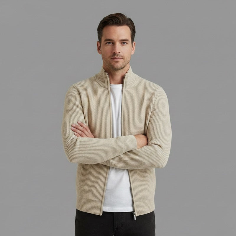 Man in a beige ribbed zip cardigan over a white tee