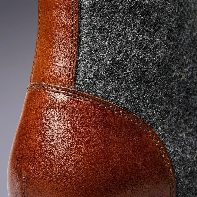 Close-up of brown heel panel on two-tone boot
