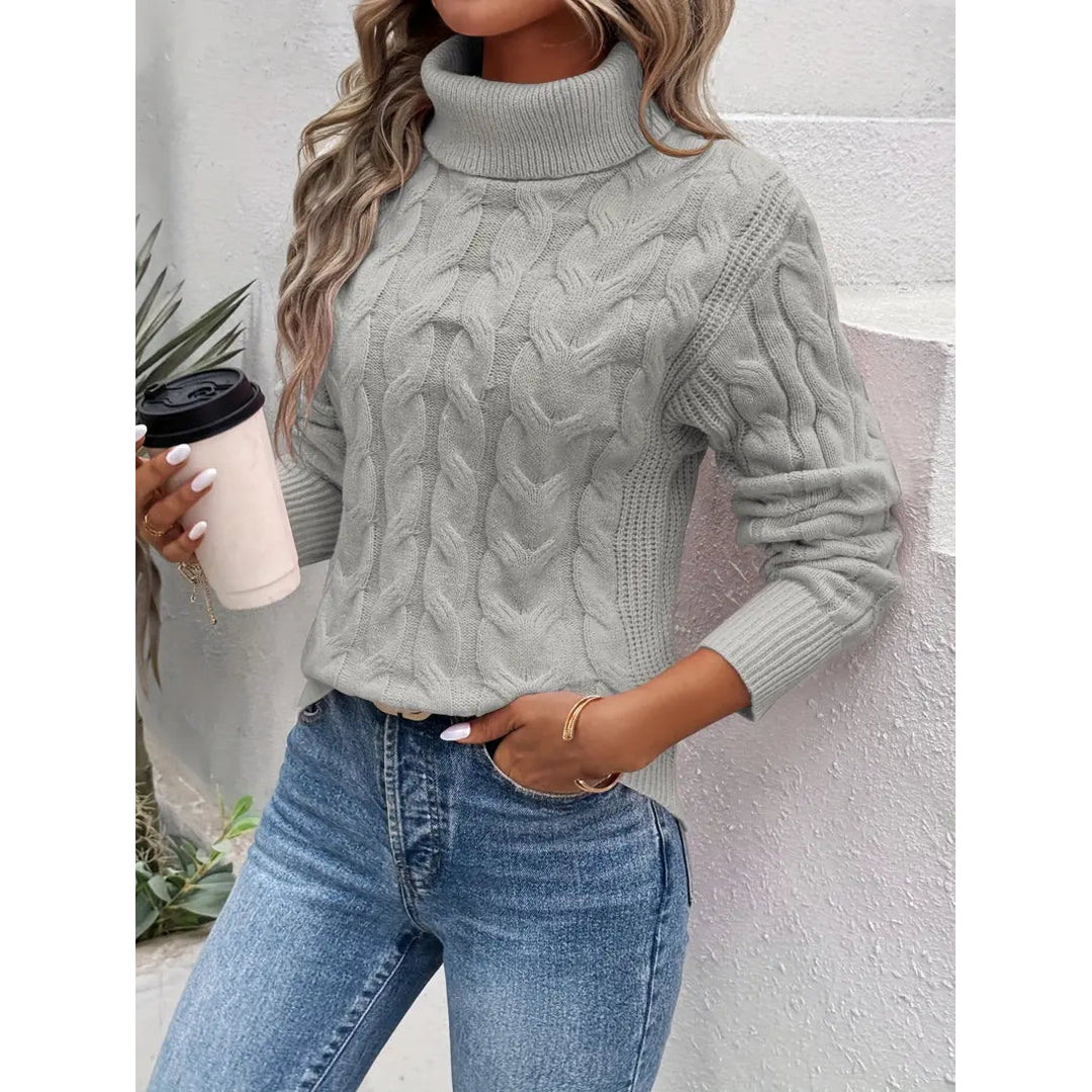 Women's grey cable knit turtleneck sweater