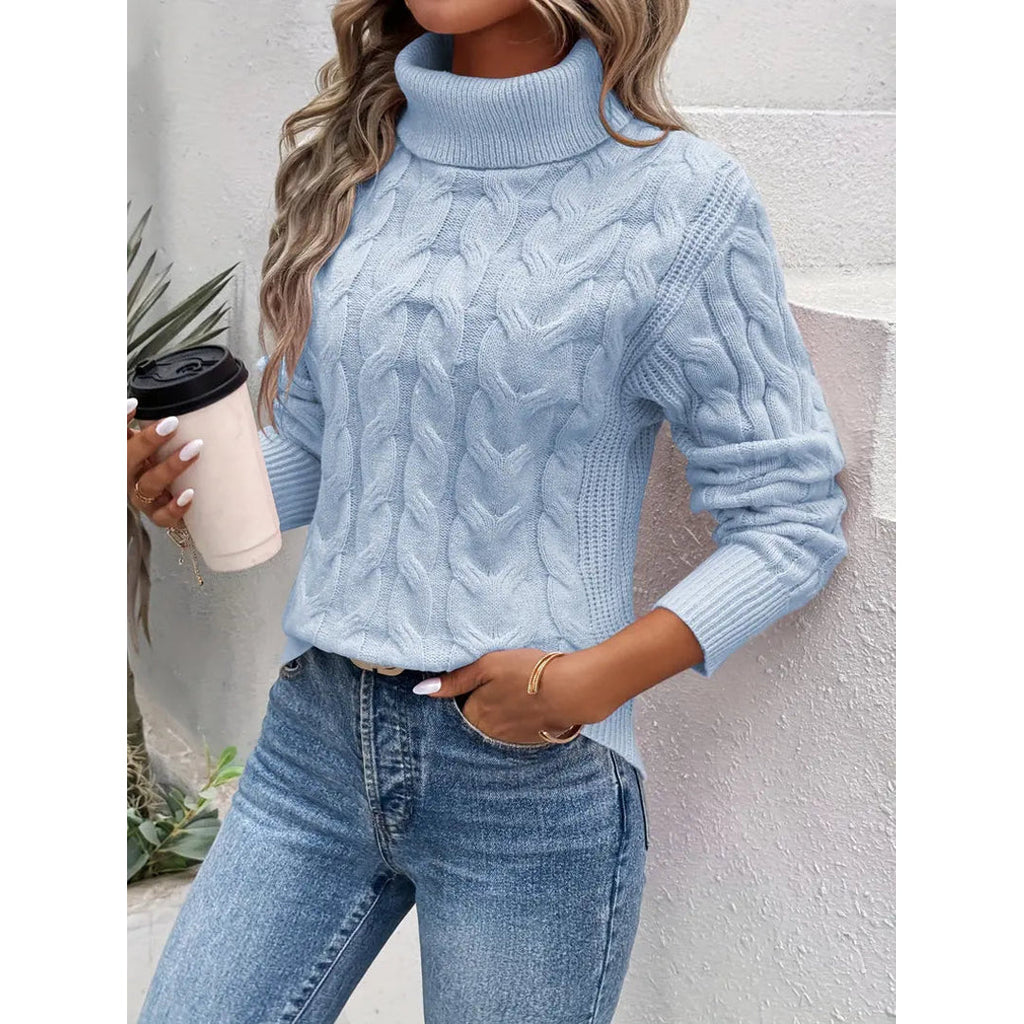 Women's light blue cable knit turtleneck sweater