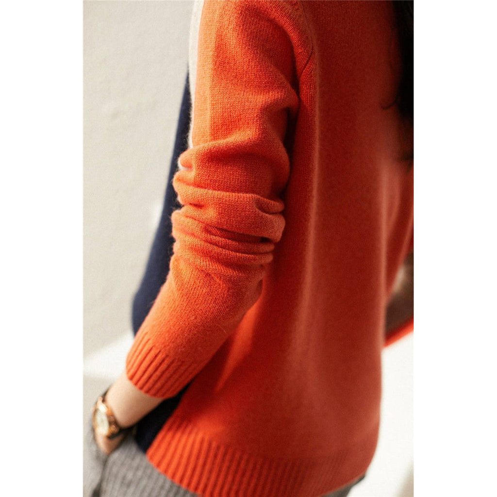 Orange back of the women's colour block sweater