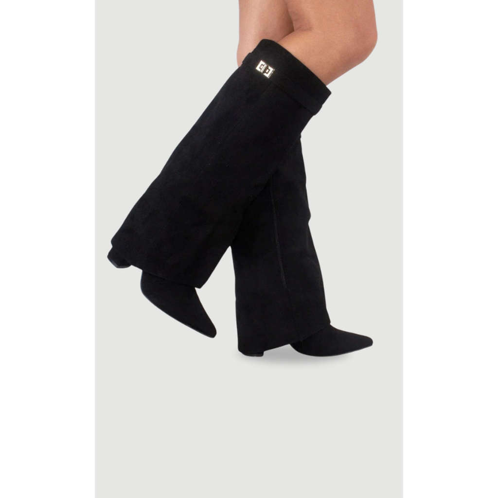 Women's black pointed toe knee-high boots in motion
