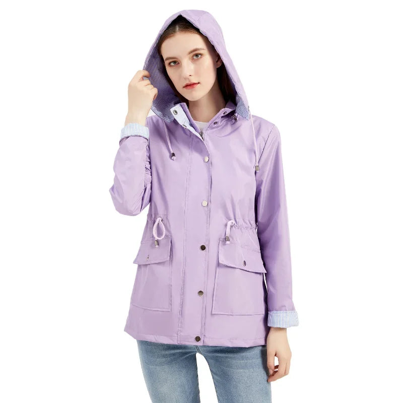 Woman wearing the lavender hooded rain jacket