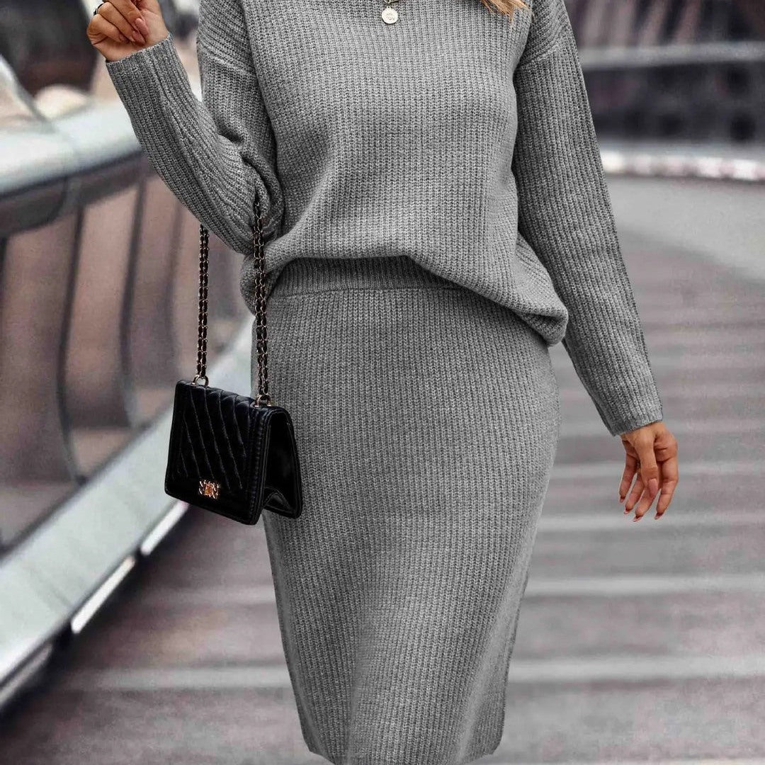 Women's knit set with mock neck sweater and midi skirt in grey