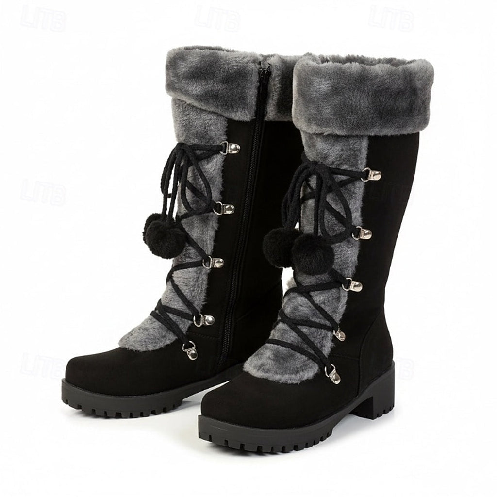 Pair of women's black lace-up winter boots