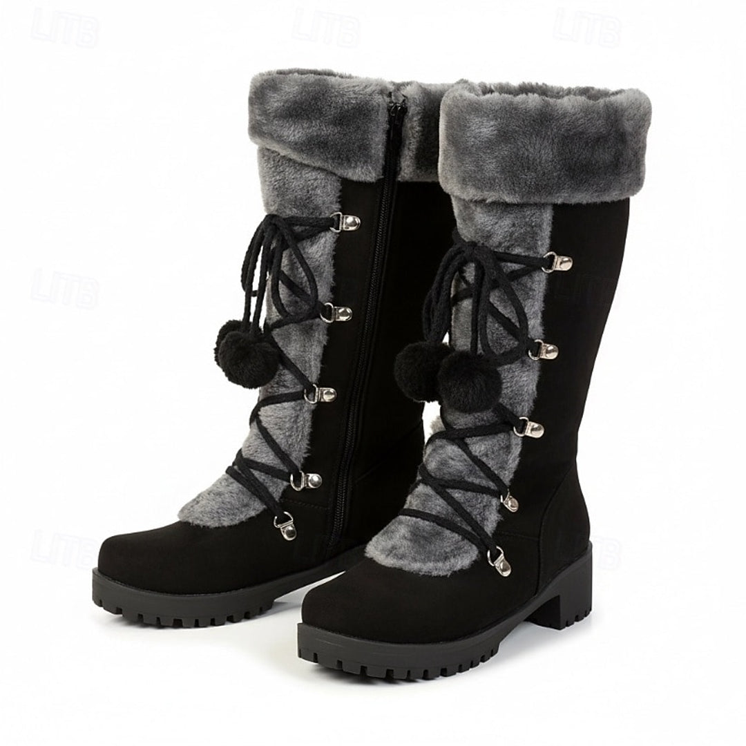 Pair of women's black lace-up winter boots