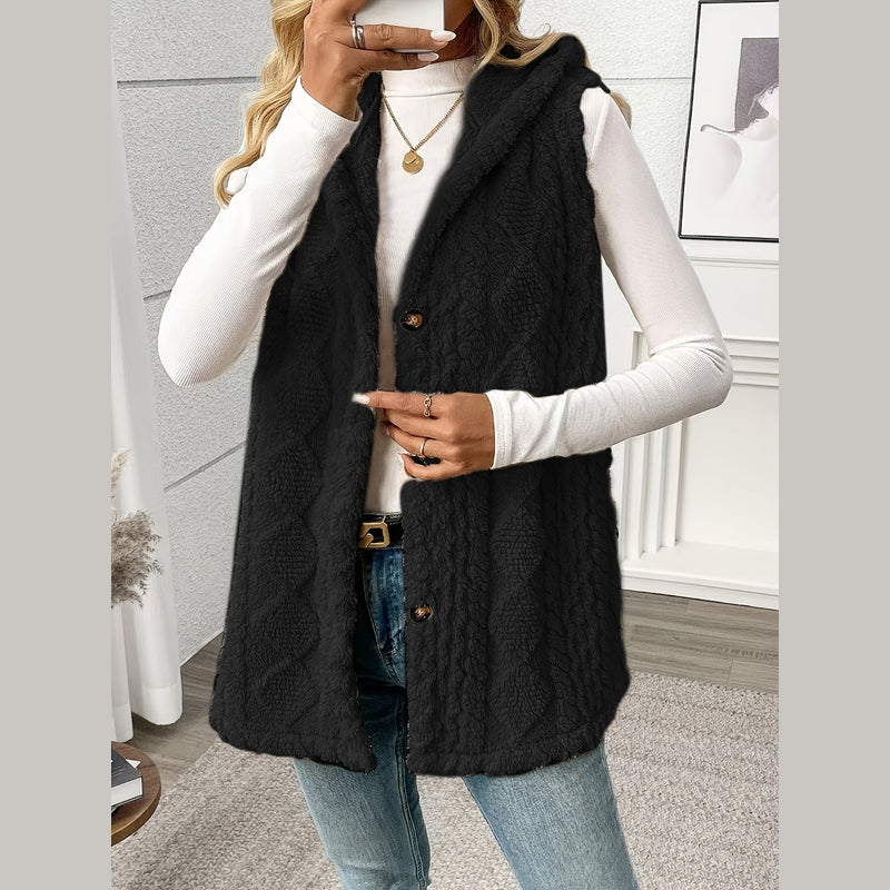Woman wearing the black long hooded knit vest