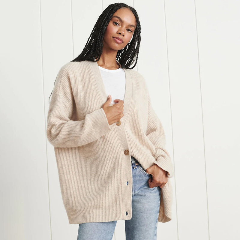 Woman wearing the oatmeal oversized cardigan with jeans