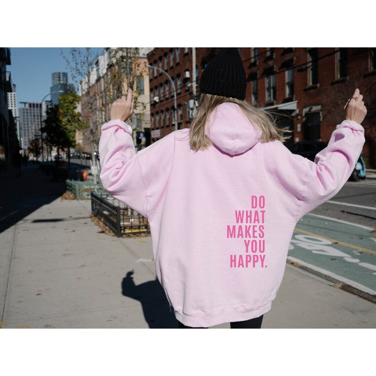 Women's oversized hoodie with back slogan print in light pink, street view