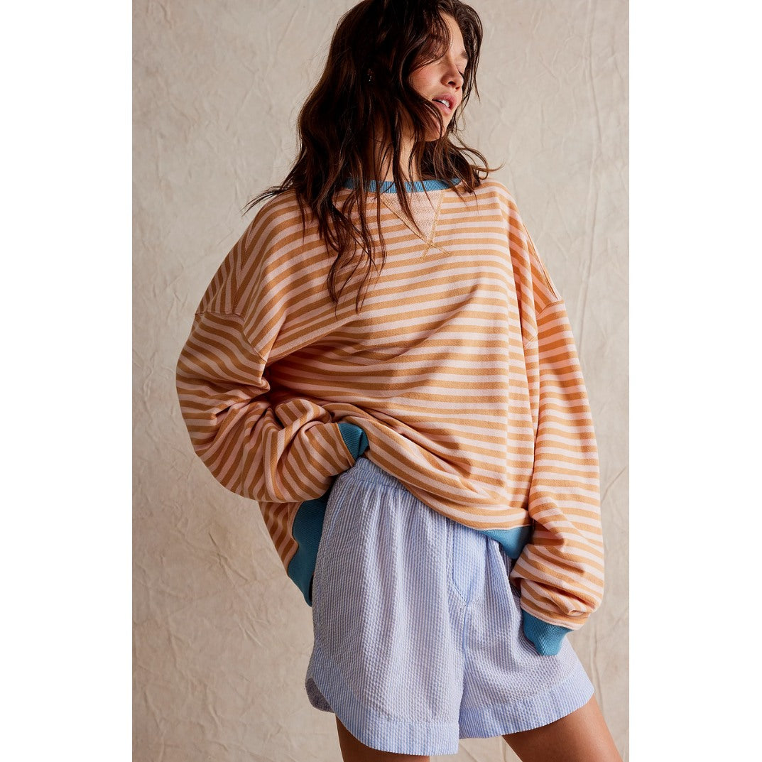 Women's oversized striped sweater in orange stripe