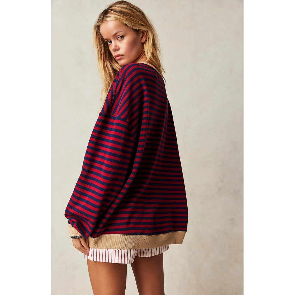 Women's oversized striped sweater in burgundy stripe, back view