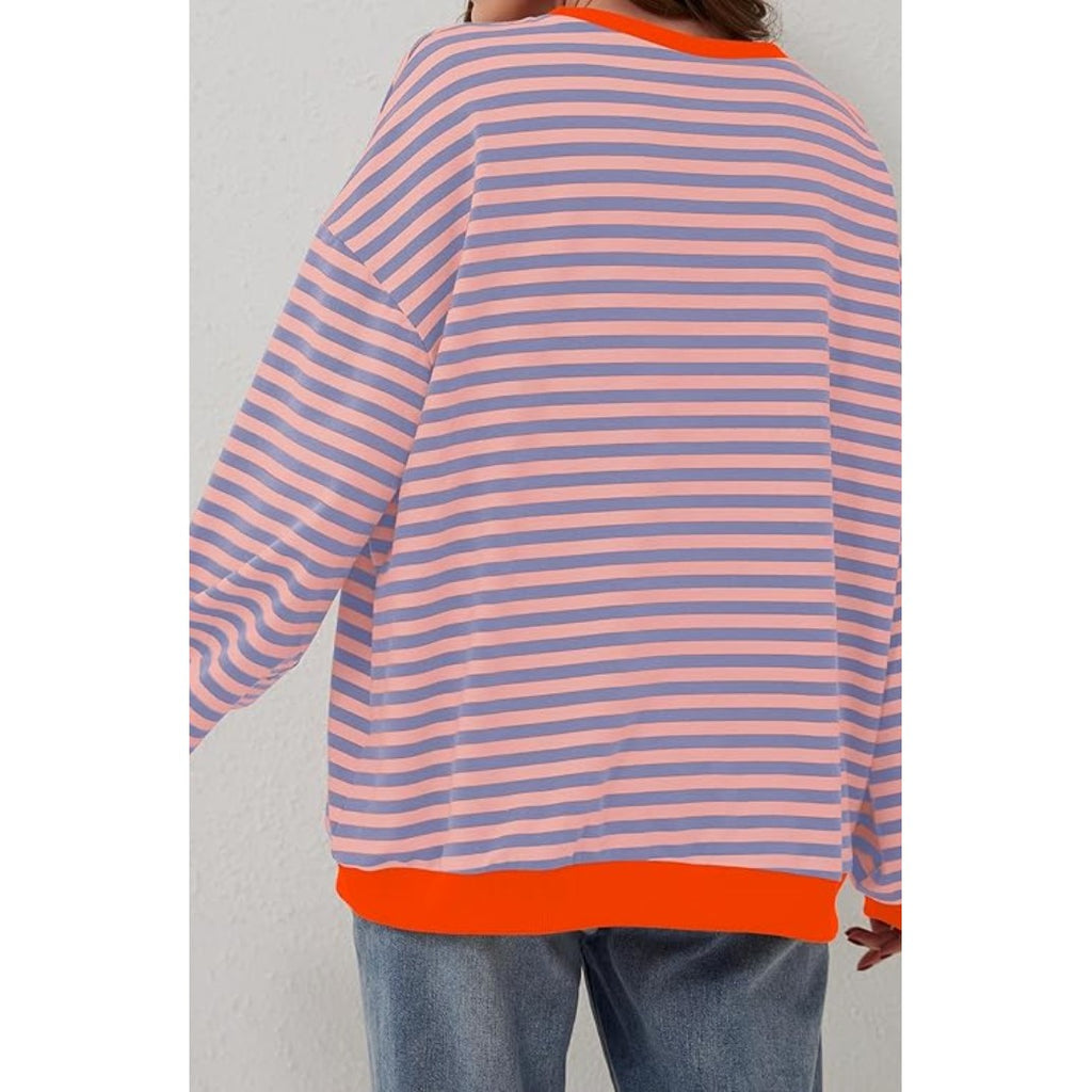 Women's oversized striped sweater in pink stripe, back view