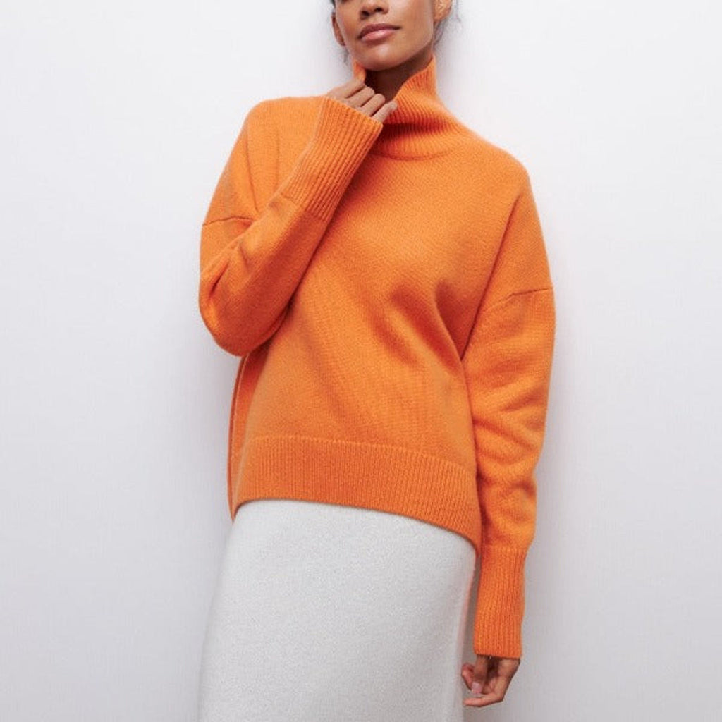 Women's orange oversized turtleneck sweater
