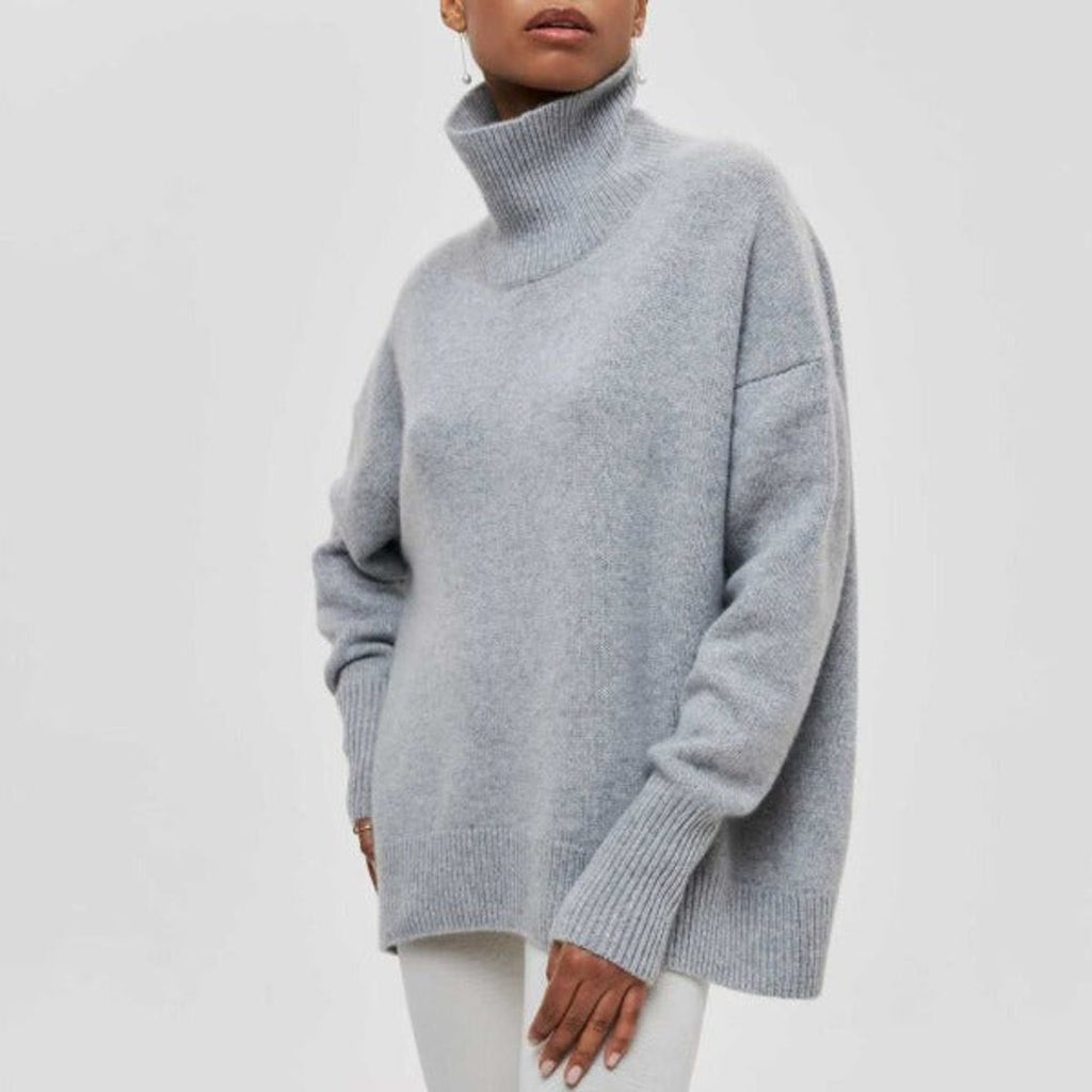 Women's grey oversized turtleneck knit sweater