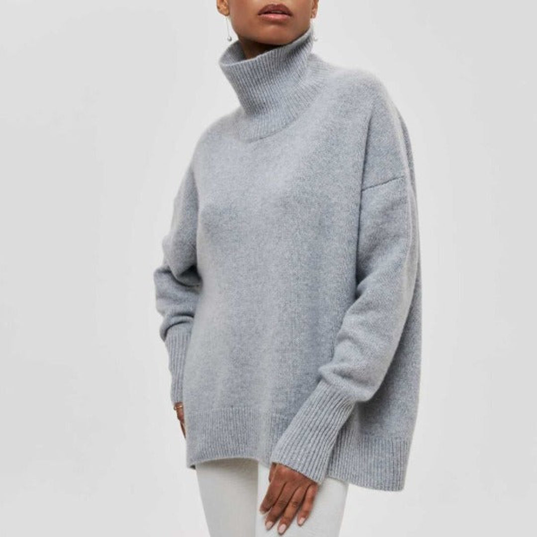 Women's grey oversized turtleneck knit sweater