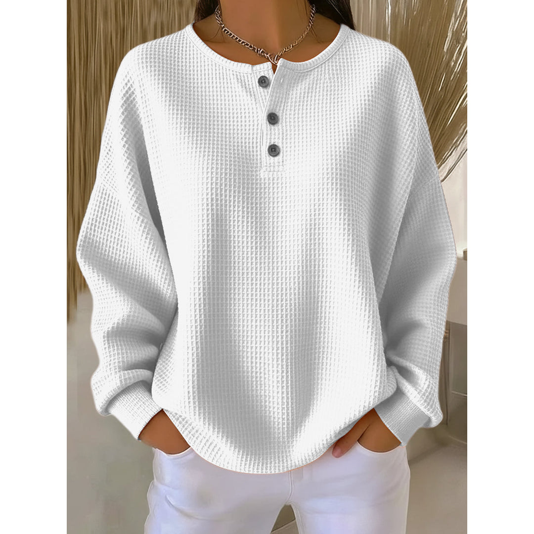 Women's white waffle knit henley pullover with button neckline