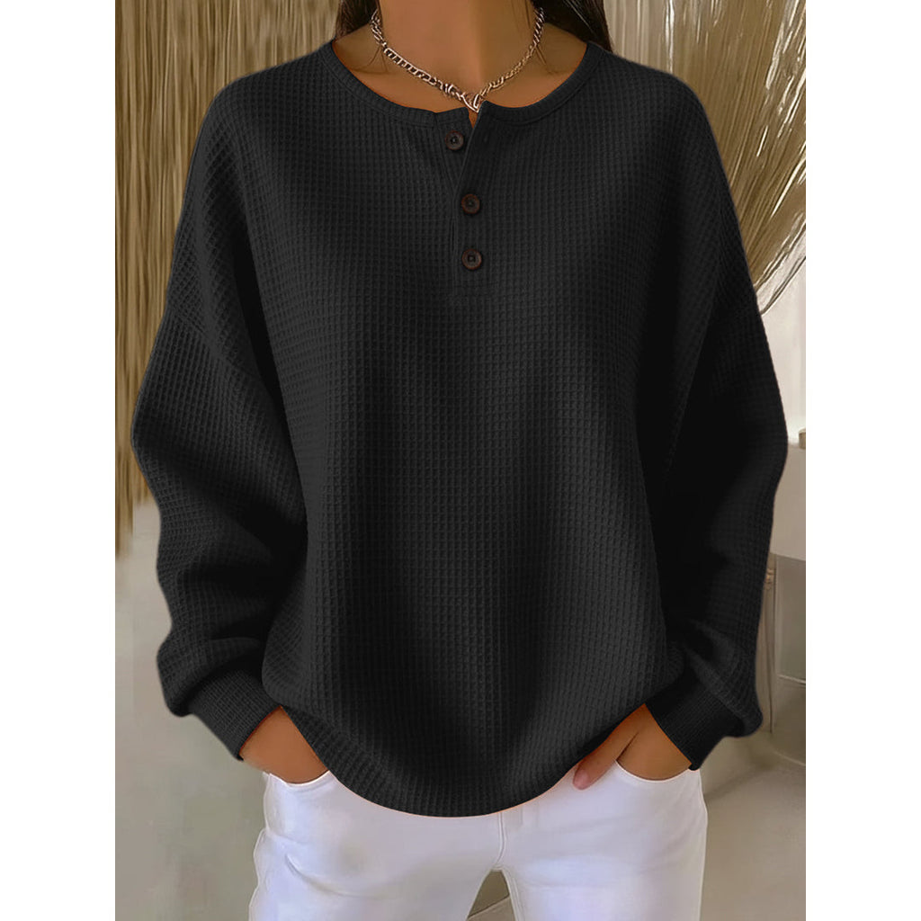 Women's black waffle knit henley pullover
