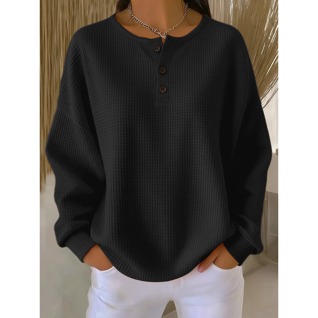 Women's black waffle knit henley pullover