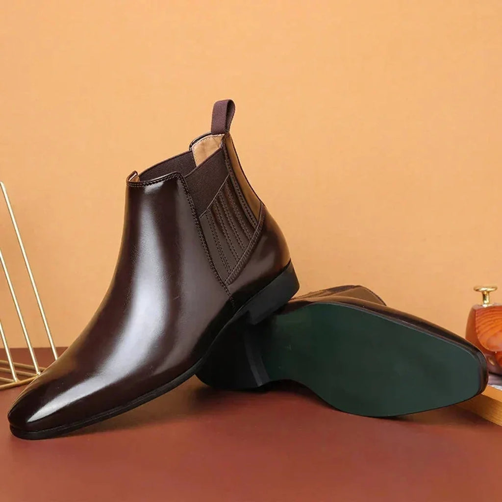 Women's dark brown Chelsea boot with sole view