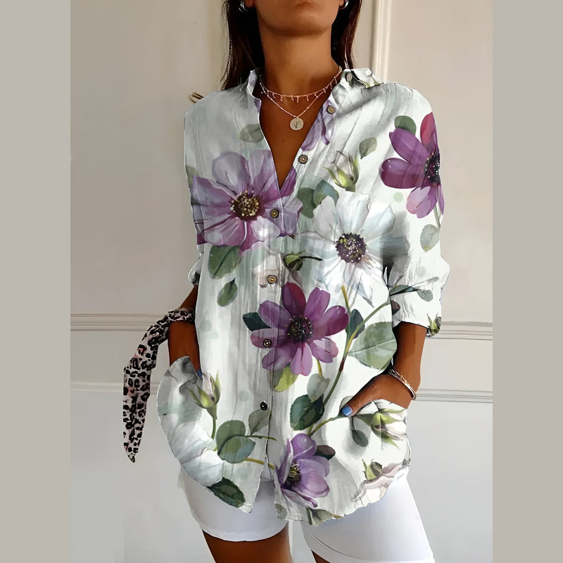 Woman wearing the purple floral shirt blouse – side view