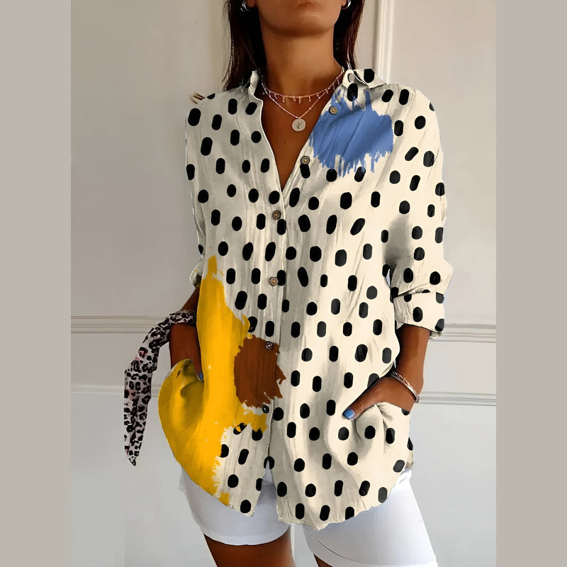 Woman wearing the polka dot shirt blouse – side view