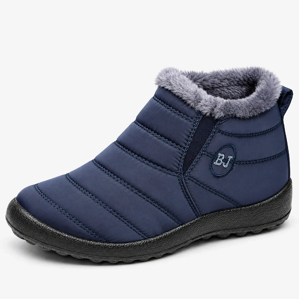 Women's navy blue quilted ankle boot with fleece-look collar