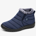 Women's navy blue quilted ankle boot with fleece-look collar