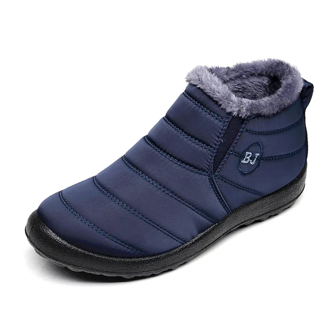 Women's navy quilted ankle boot – front view