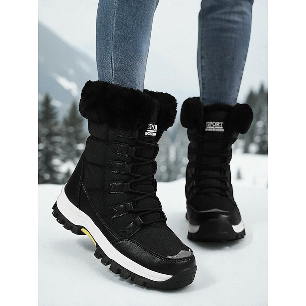Women's black quilted lace-up snow boots