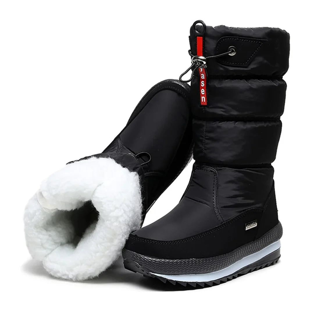 Women's black snow boot showing the fleece-look lining