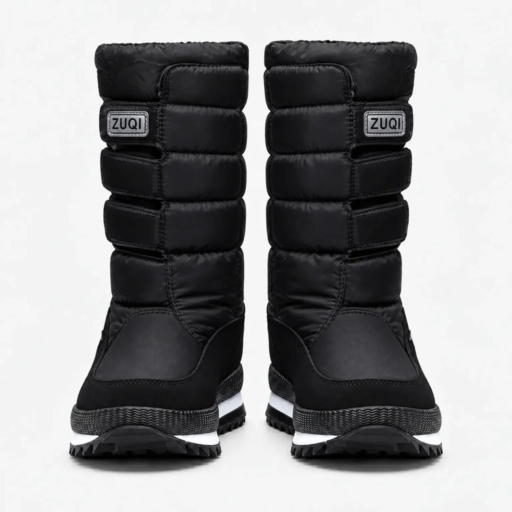 Women's black quilted snow boots with strap detail