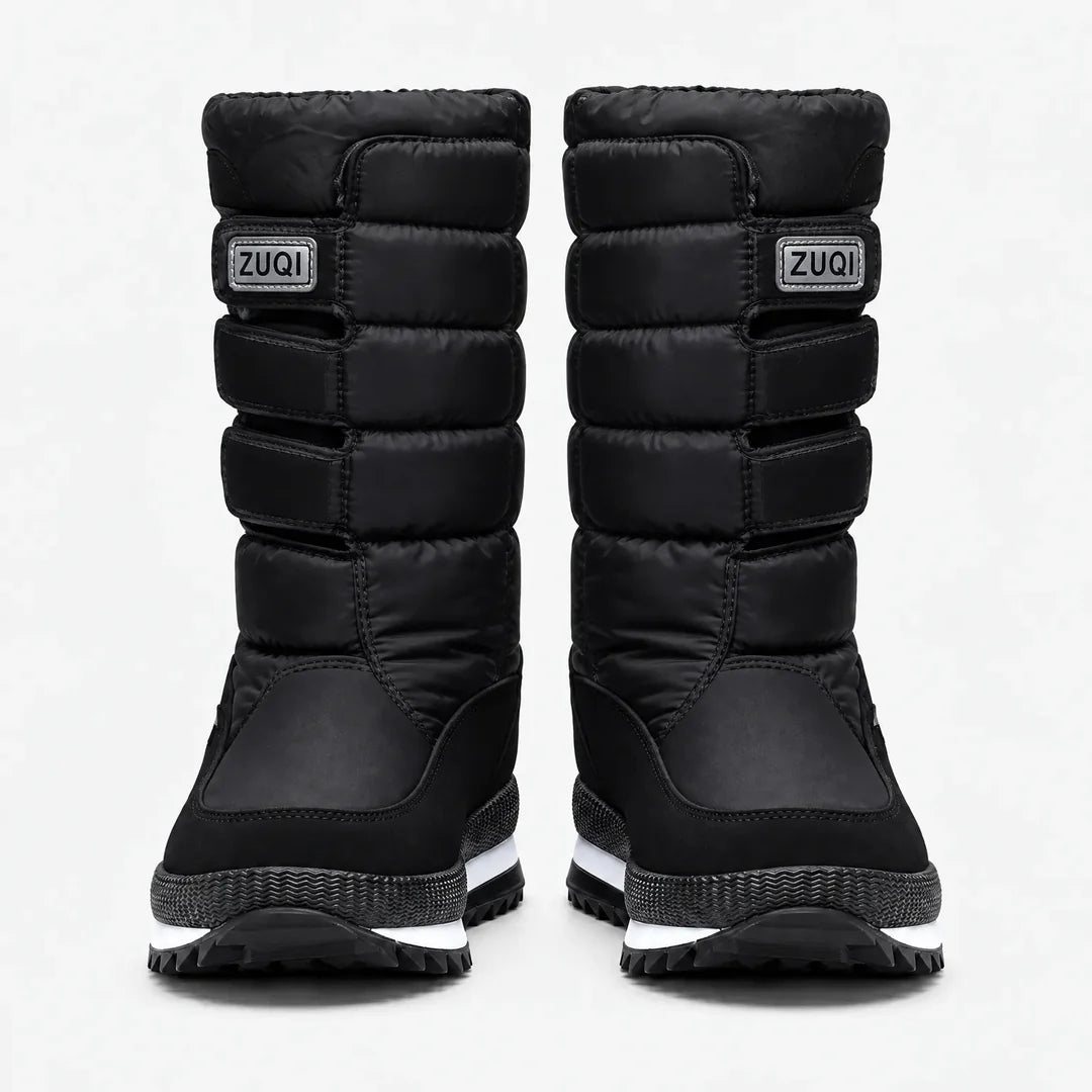 Women's black quilted snow boots with strap detail
