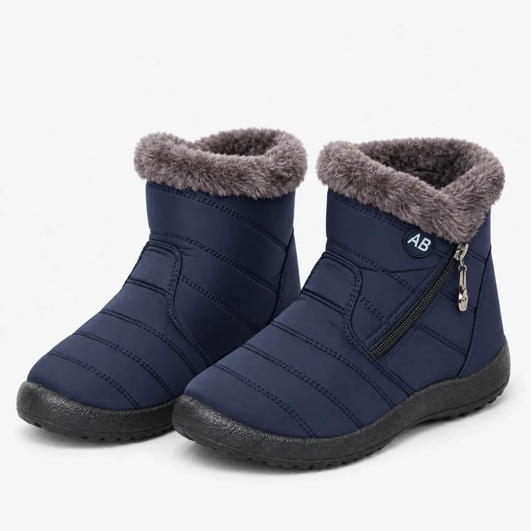 Pair of women's navy blue quilted winter boots
