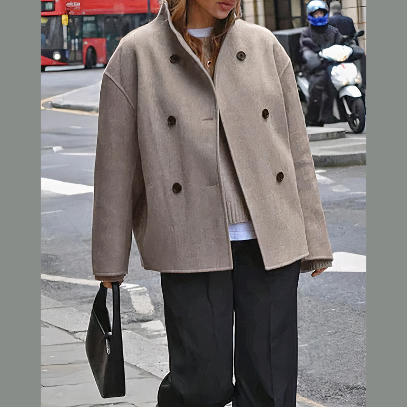 Woman wearing the light brown short coat – front view