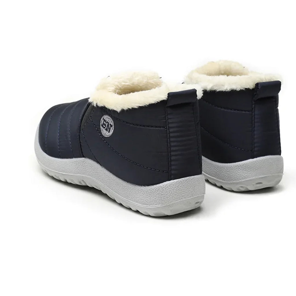 Women's navy quilted ankle boots – back view
